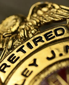 Retired Correction Officer Timothy Heaton receives his Retired Shield